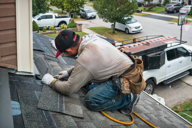 Professional Roof Replacement technician working in Augusta, MI